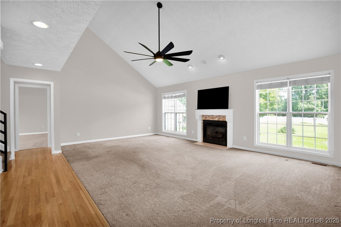995 Adcox Road Raeford, NC 28376 - Photo 16 of 50 a view of a livingroom with a fireplace and a window
