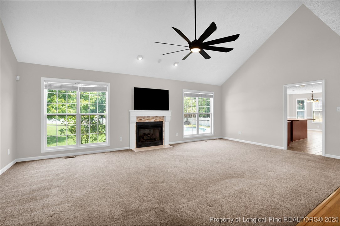 995 Adcox Road Raeford, NC 28376 - Photo 17 of 50 a view of an empty room with window and fire place