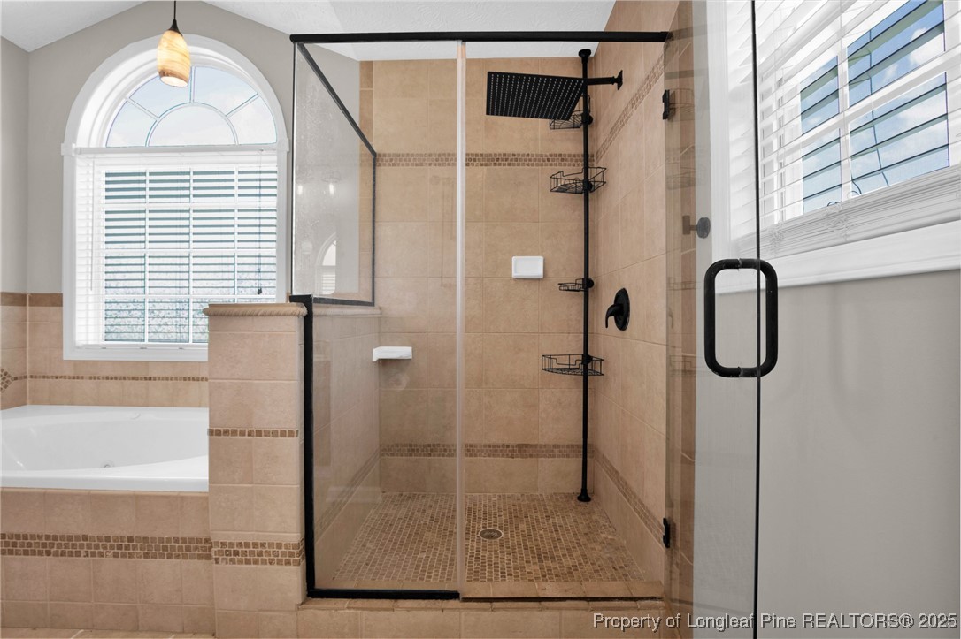 995 Adcox Road Raeford, NC 28376 - Photo 30 of 50 a bathroom with a shower