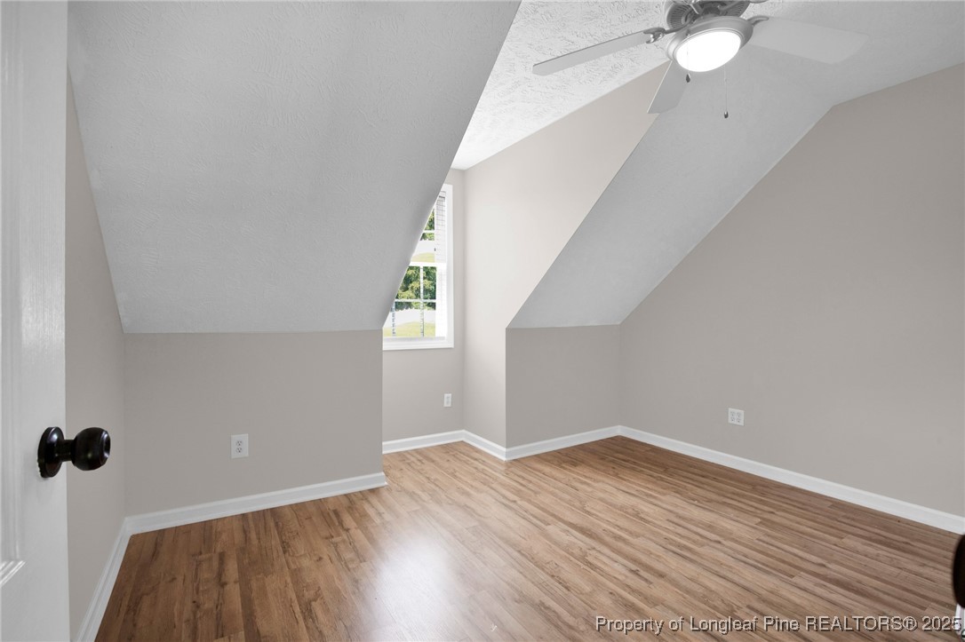 995 Adcox Road Raeford, NC 28376 - Photo 34 of 50 wooden floor in an empty room with a window