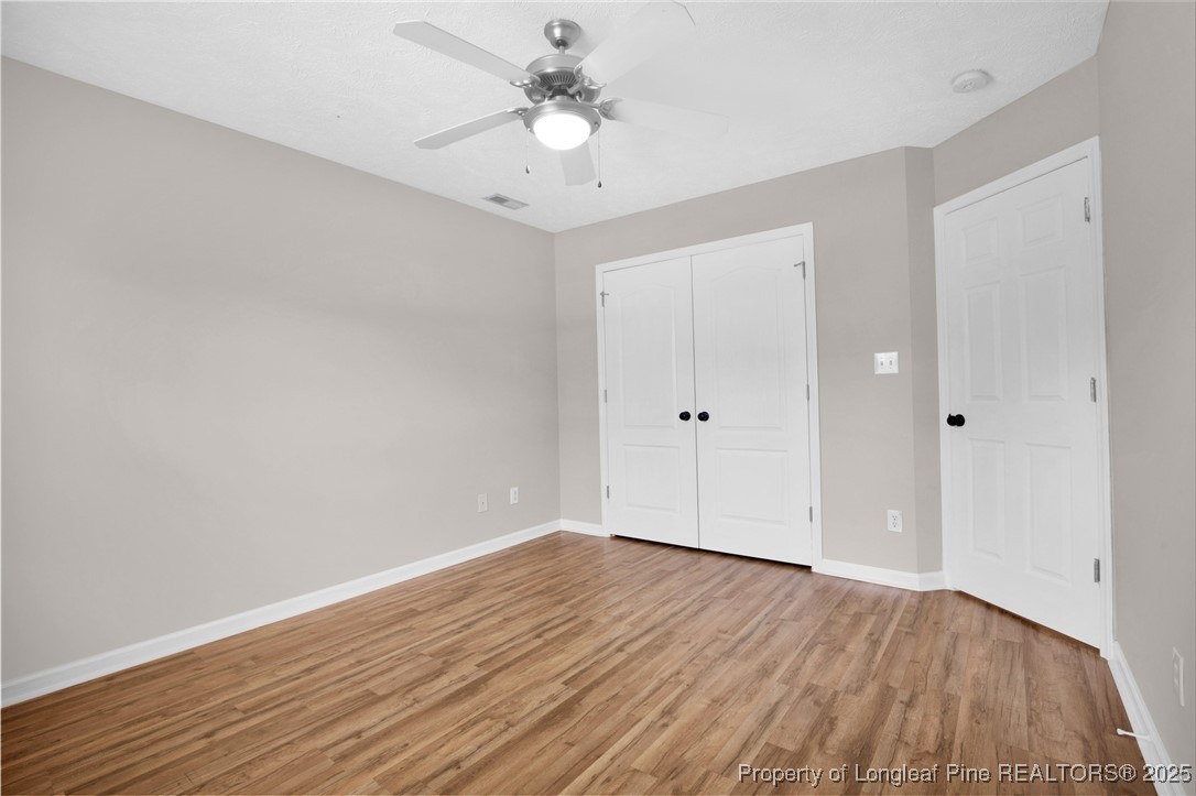 995 Adcox Road Raeford, NC 28376 - Photo 39 of 50 wooden floor in an empty room