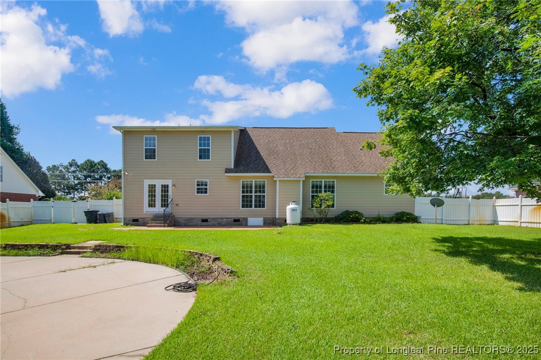 995 Adcox Road Raeford, NC 28376 - Photo 49 of 50 a front view of a house with a yard and garage