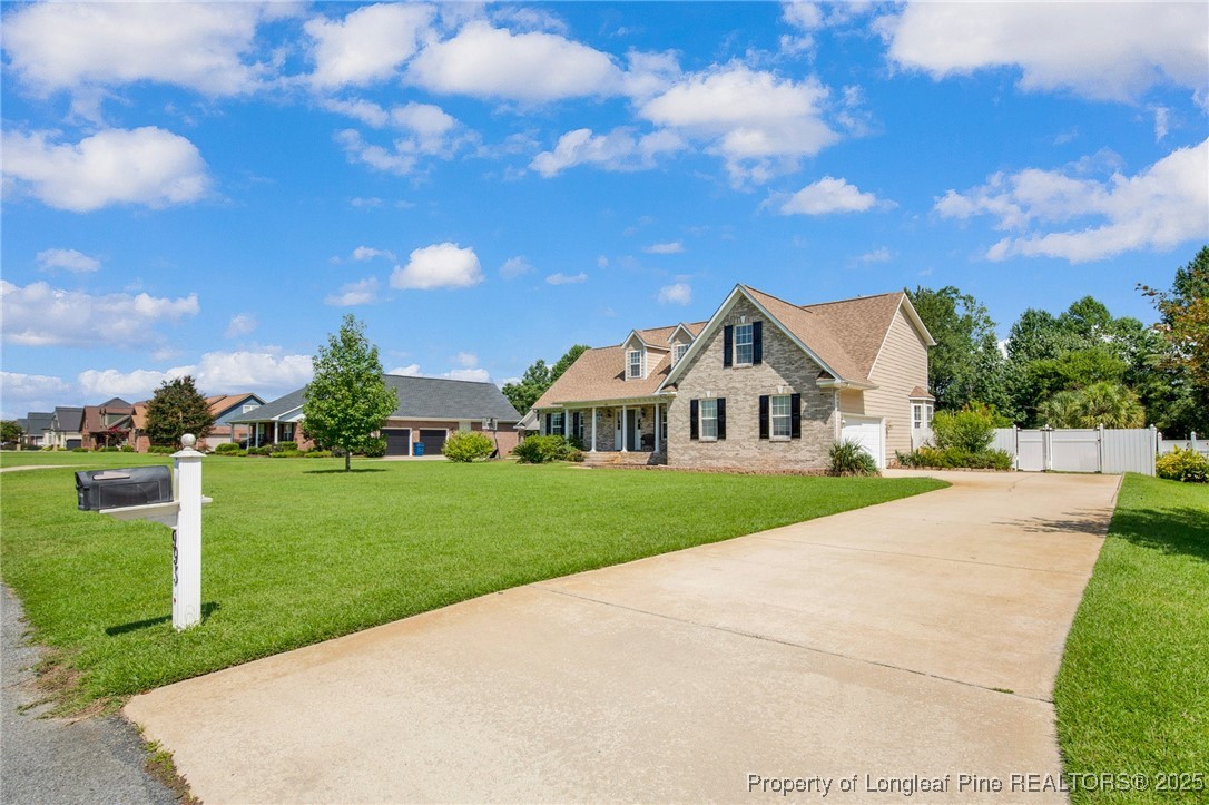 995 Adcox Road Raeford, NC 28376 - Photo 6 of 50 a front view of a house with yard