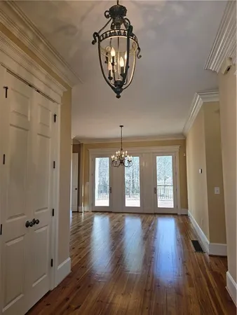 a bathroom with a sink a mirror and a toilet
