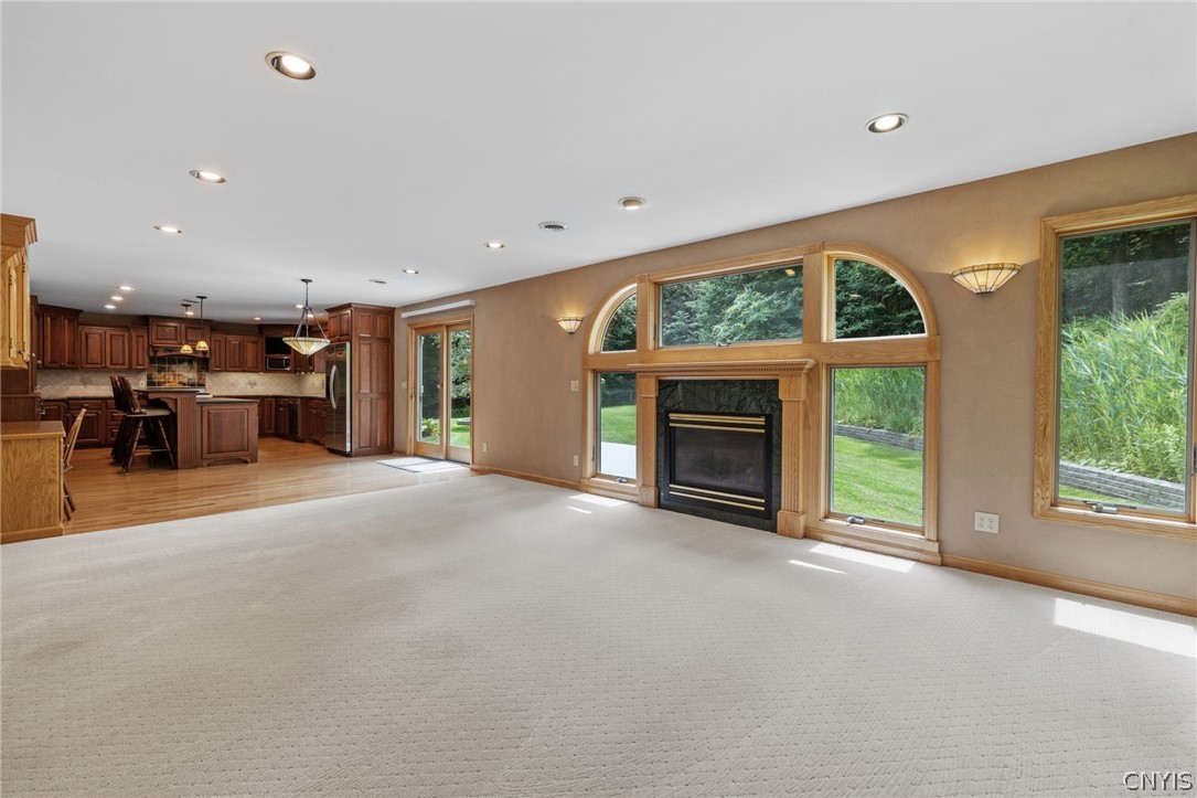 1103 Rail Fence Road Camillus, NY 13031 - Photo 24 of 50 Large family room with gas fireplace