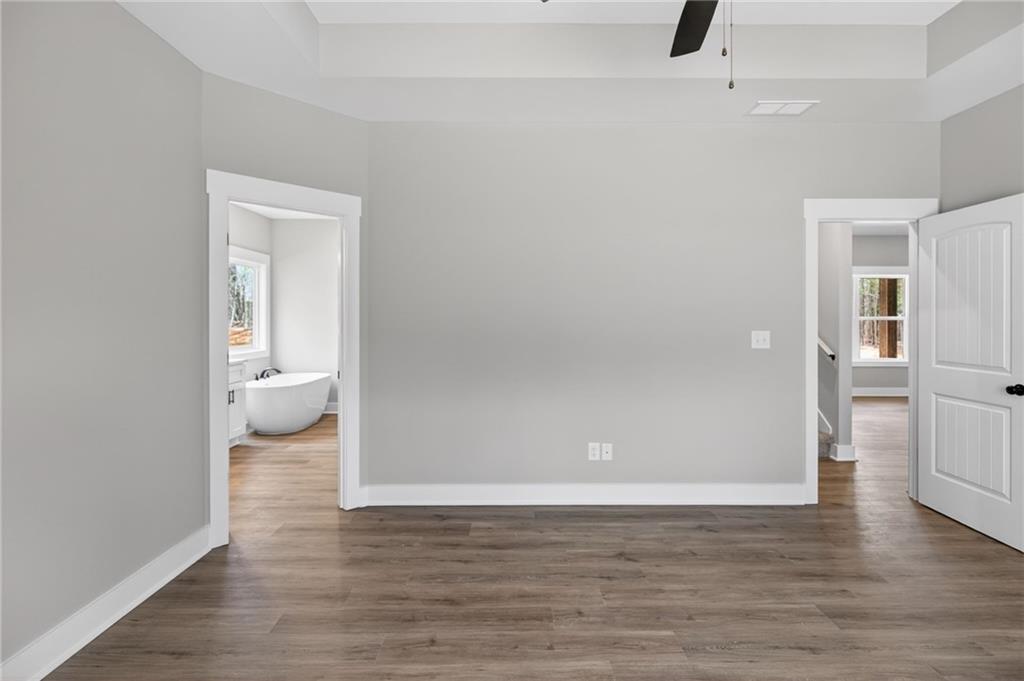 423 Relay Road Silver Creek, GA 30173 - Photo 27 of 48 a view of empty room with wooden floor