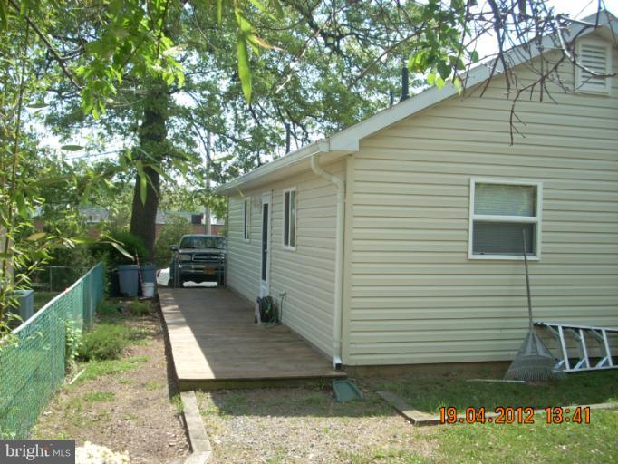 1608 Marlboro Road Edgewater, MD 21037 - Photo 2 of 24 a view of a backyard with sitting area