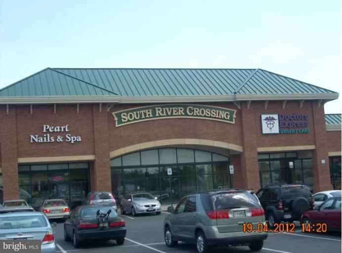 1608 Marlboro Road Edgewater, MD 21037 - Photo 13 of 24 a front view of a building with parking space