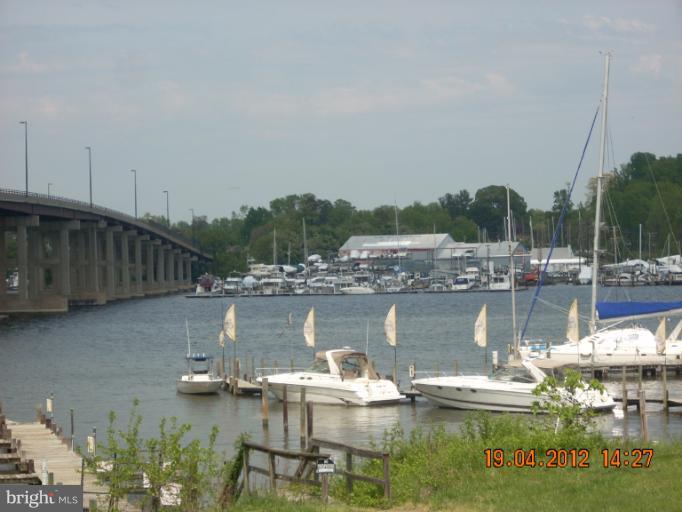 1608 Marlboro Road Edgewater, MD 21037 - Photo 14 of 24 a view of a lake with a house