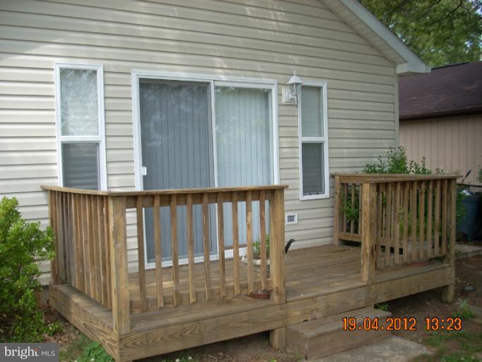 1608 Marlboro Road Edgewater, MD 21037 - Photo 15 of 24 a view of a wooden door of a house