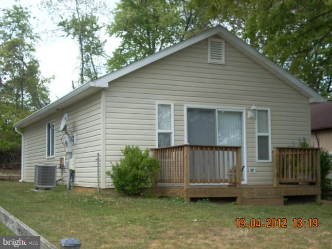 1608 Marlboro Road Edgewater, MD 21037 - Photo 18 of 24 a view of a house with a yard