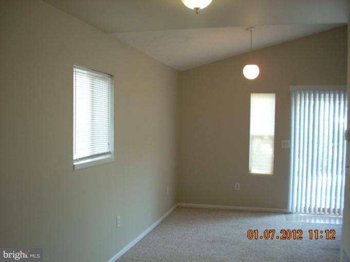 1608 Marlboro Road Edgewater, MD 21037 - Photo 19 of 24 an empty room with a window