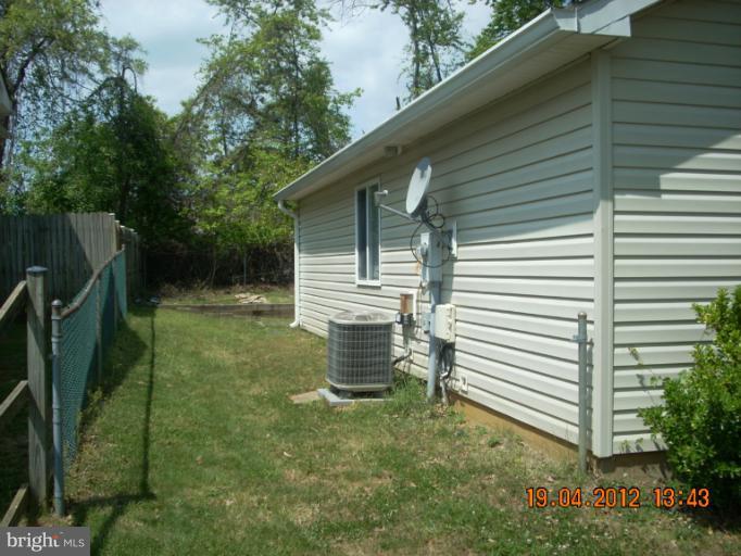 1608 Marlboro Road Edgewater, MD 21037 - Photo 3 of 24 a house view with a backyard space