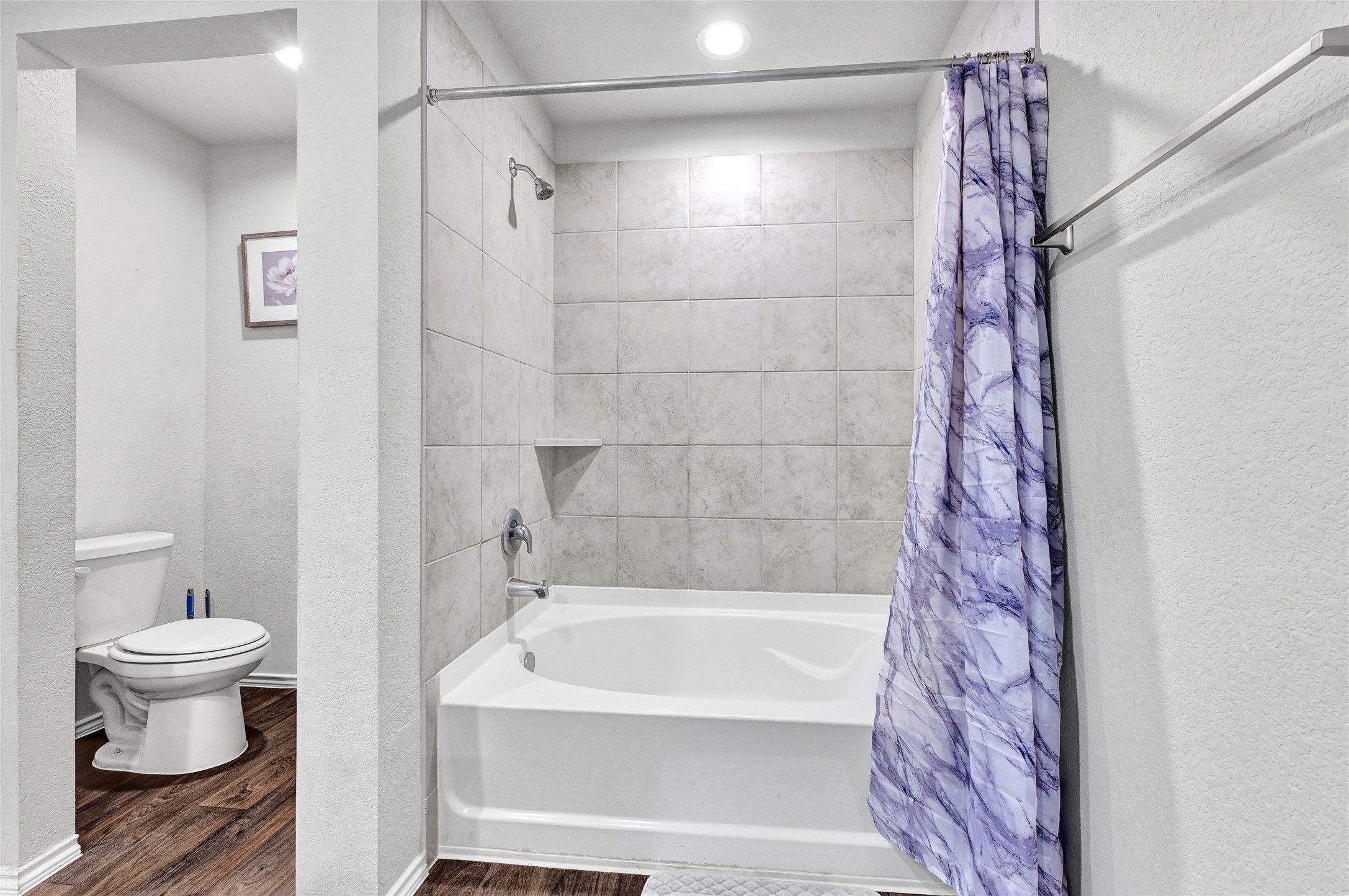 22750 Winter Maple Trail Spring, TX 77373 - Photo 11 of 18 a bathroom with a bathtub and a toilet