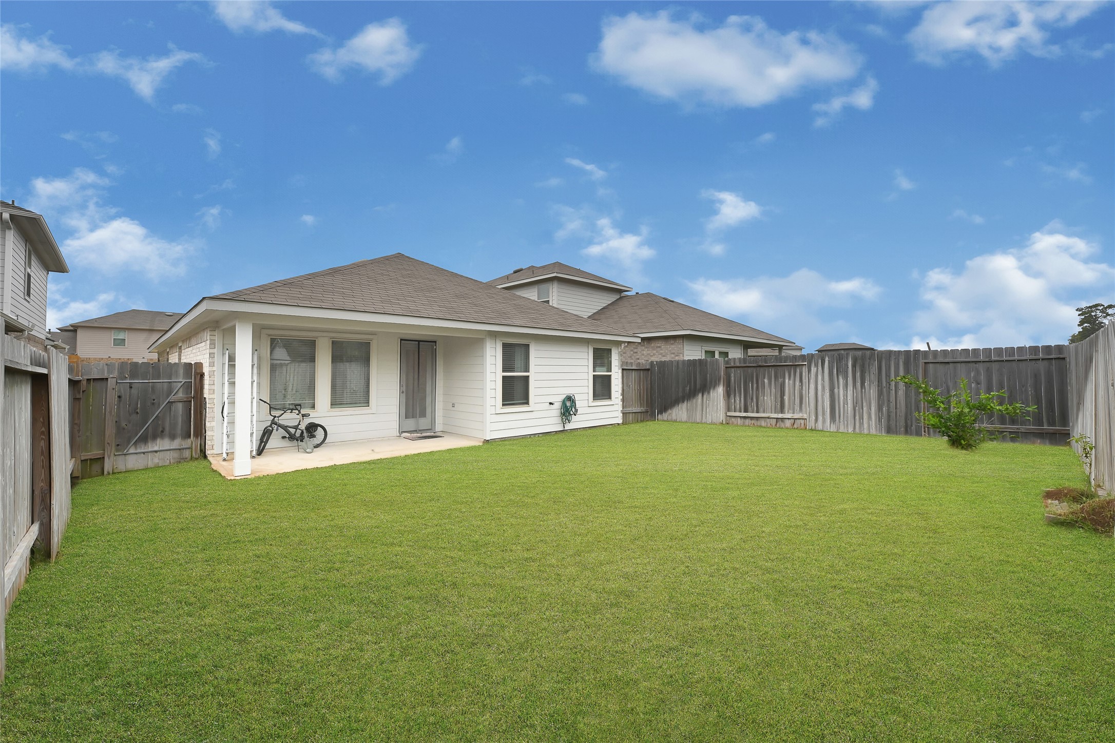 22750 Winter Maple Trail Spring, TX 77373 - Photo 17 of 18 a front view of a house with a garden