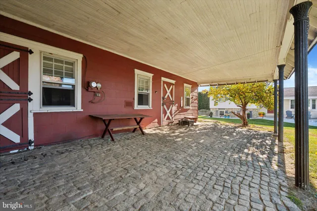 a view of workspace with window and cabinet