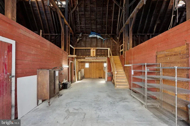 a view of wooden deck and a yard