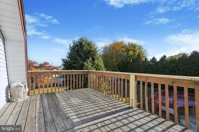 a view of a swimming pool with an outdoor seating