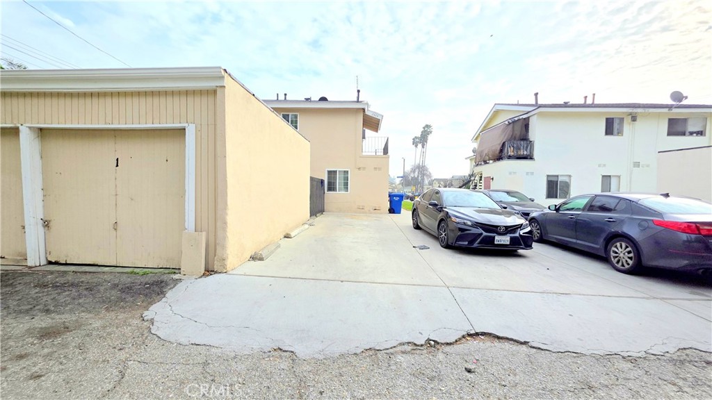 2325 Angela Street, Unit 4 Pomona, CA 91766 - Photo 21 of 21 a car parked in front of house