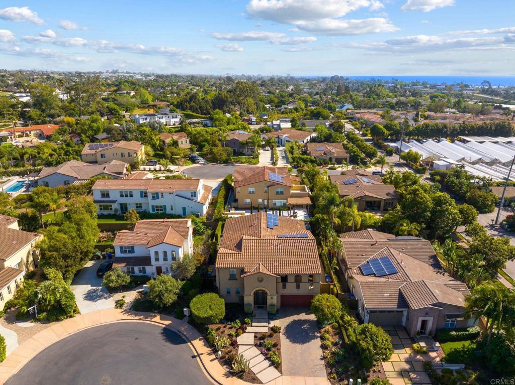 809 Dolphin Circle Encinitas, CA 92024 - Photo 8 of 71 an aerial view of a city with lots of residential buildings