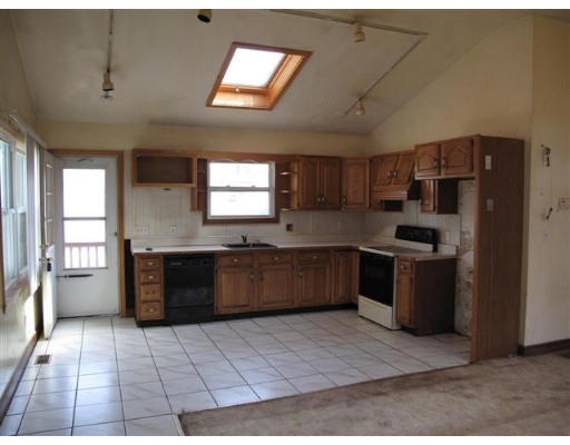 12 Summit Road Holbrook, MA 02343 - Photo 4 of 13 a kitchen with stainless steel appliances granite countertop a stove a sink dishwasher and a refrigerator