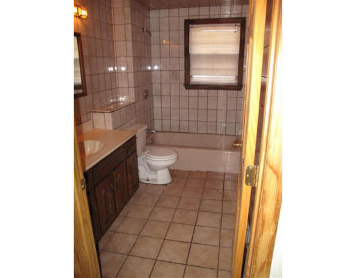 12 Summit Road Holbrook, MA 02343 - Photo 7 of 13 a bathroom with a toilet and a shower