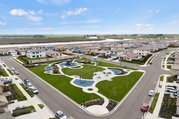 an aerial view of a pool yard patio and outdoor seating
