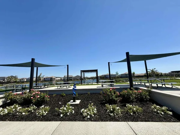 a view of swimming pool with a yard and outdoor seating