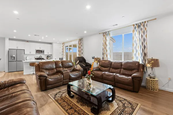 a living room with furniture and a couch