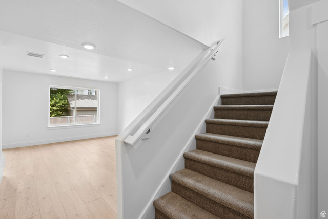 1617 North Angel Street Layton, UT 84041 - Photo 16 of 43 Staircase with wood finished floors and recessed lighting