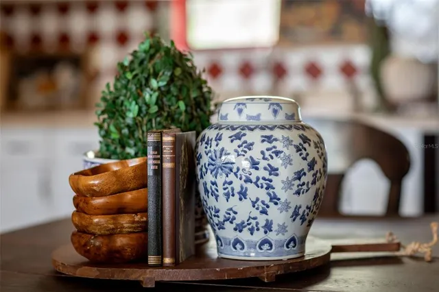 a view of a vase of flowers sitting on a table