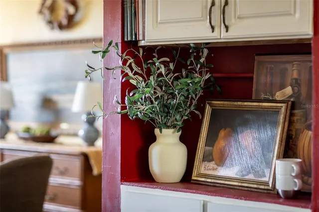 a vase of flowers sitting on a table