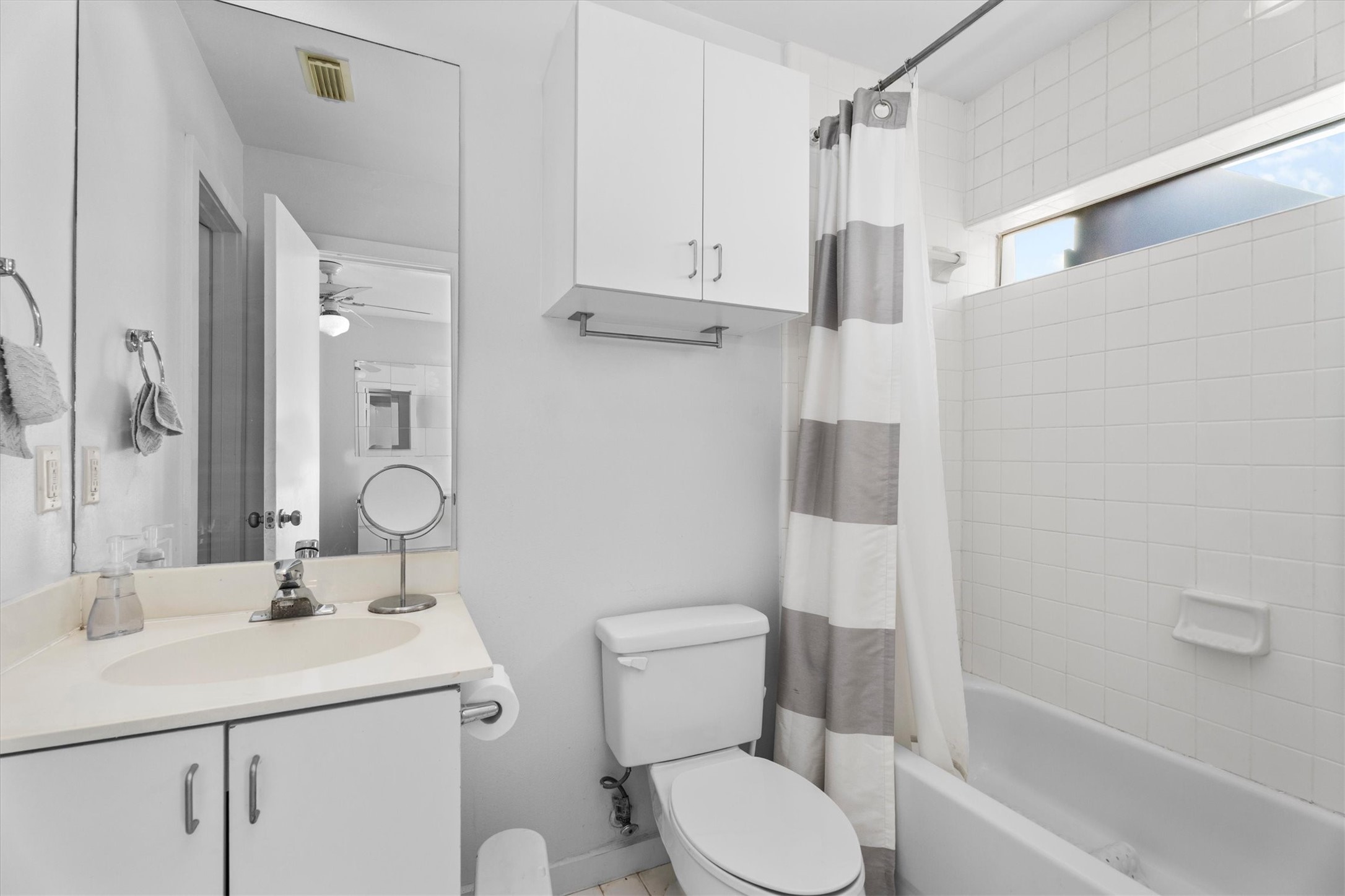 2711 Chenevert Street Houston, TX 77004 - Photo 23 of 33 a bathroom with a sink toilet and shower