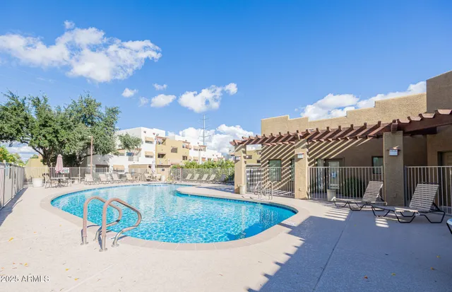 a view of a house with swimming pool