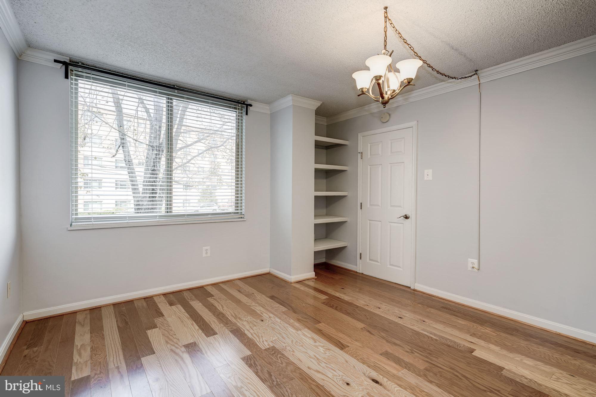 1515 South Arlington Ridge Road, Unit 205 Arlington, VA 22202 - Photo 15 of 30 2nd/guest BR w/a large window & built-ins