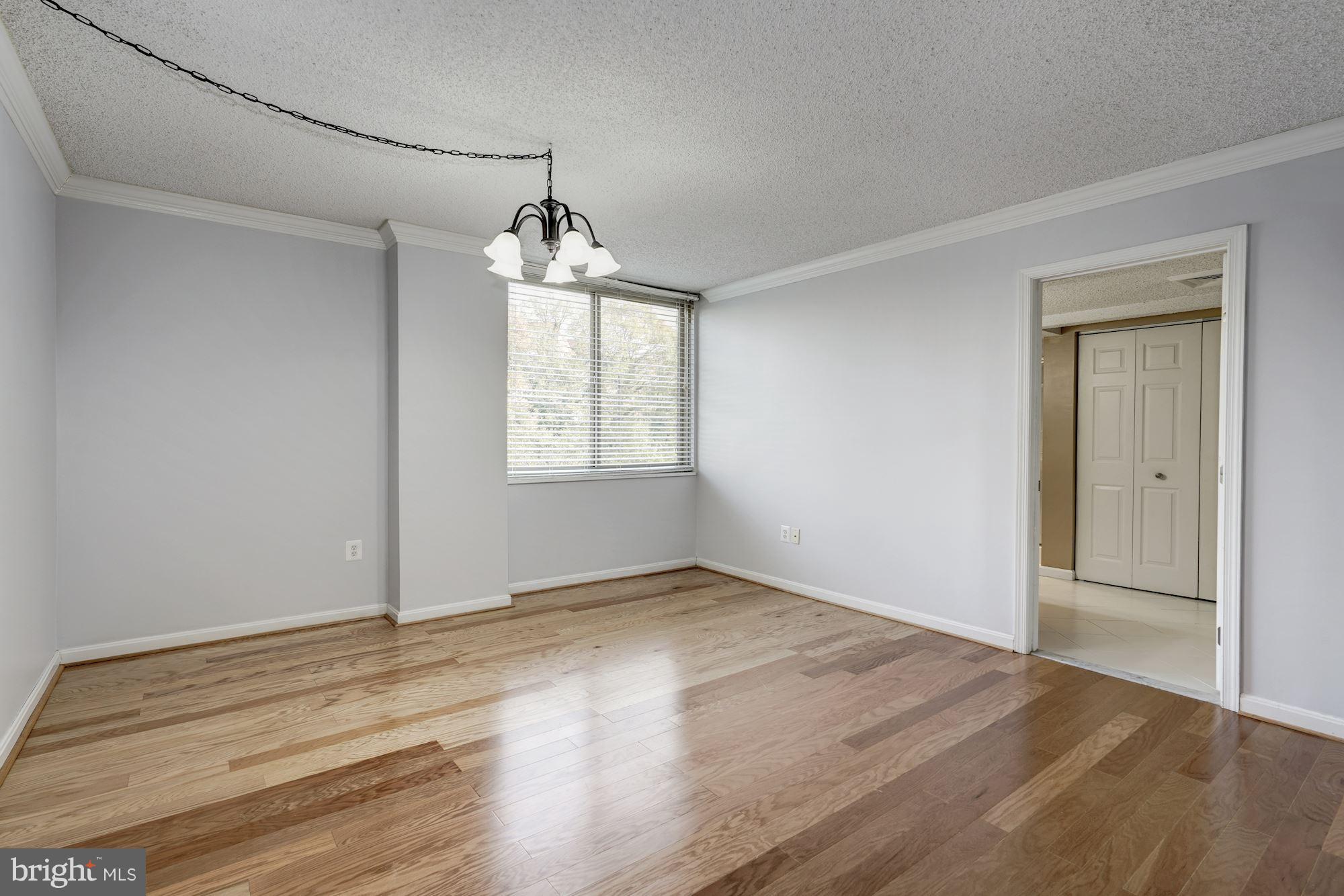 1515 South Arlington Ridge Road, Unit 205 Arlington, VA 22202 - Photo 17 of 30 Serene king-size master bedroom