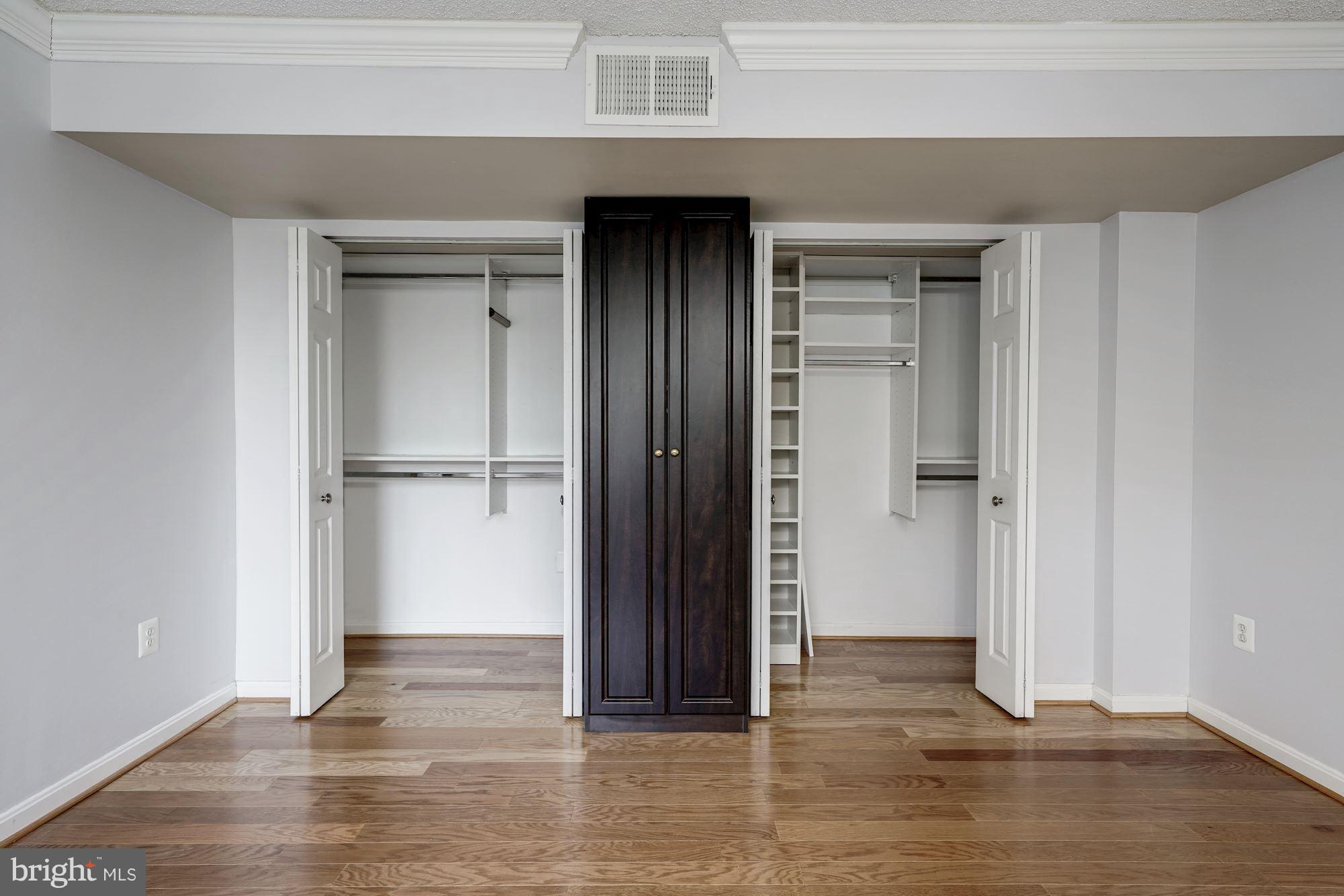 1515 South Arlington Ridge Road, Unit 205 Arlington, VA 22202 - Photo 19 of 30 Master bedroom closets w/custom organization