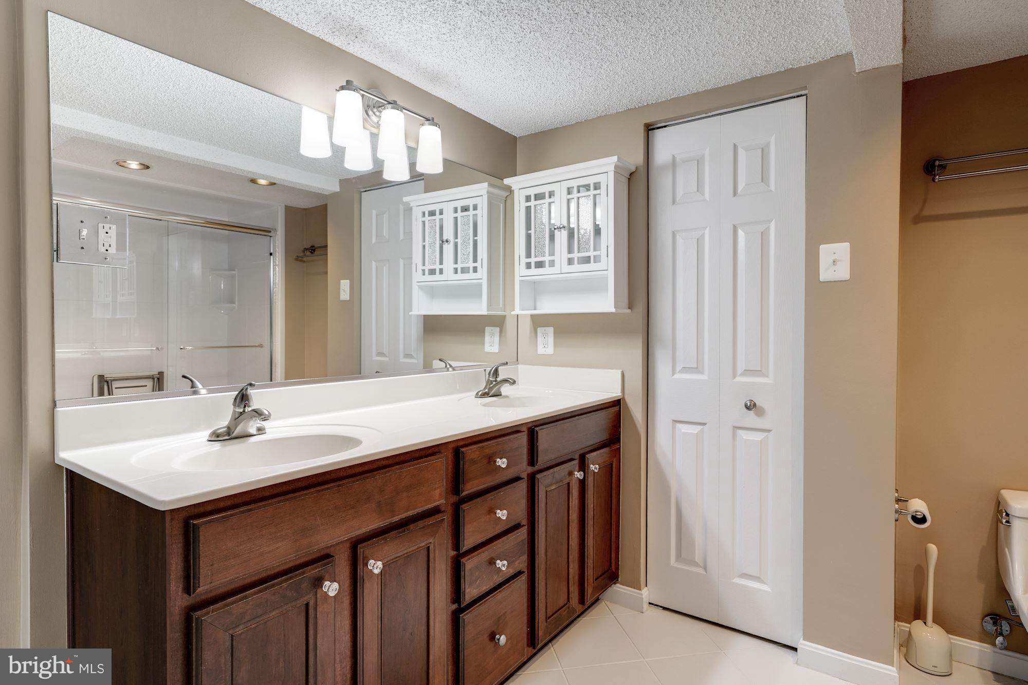 1515 South Arlington Ridge Road, Unit 205 Arlington, VA 22202 - Photo 20 of 30 Large Master bath w/double vanity & linen closet