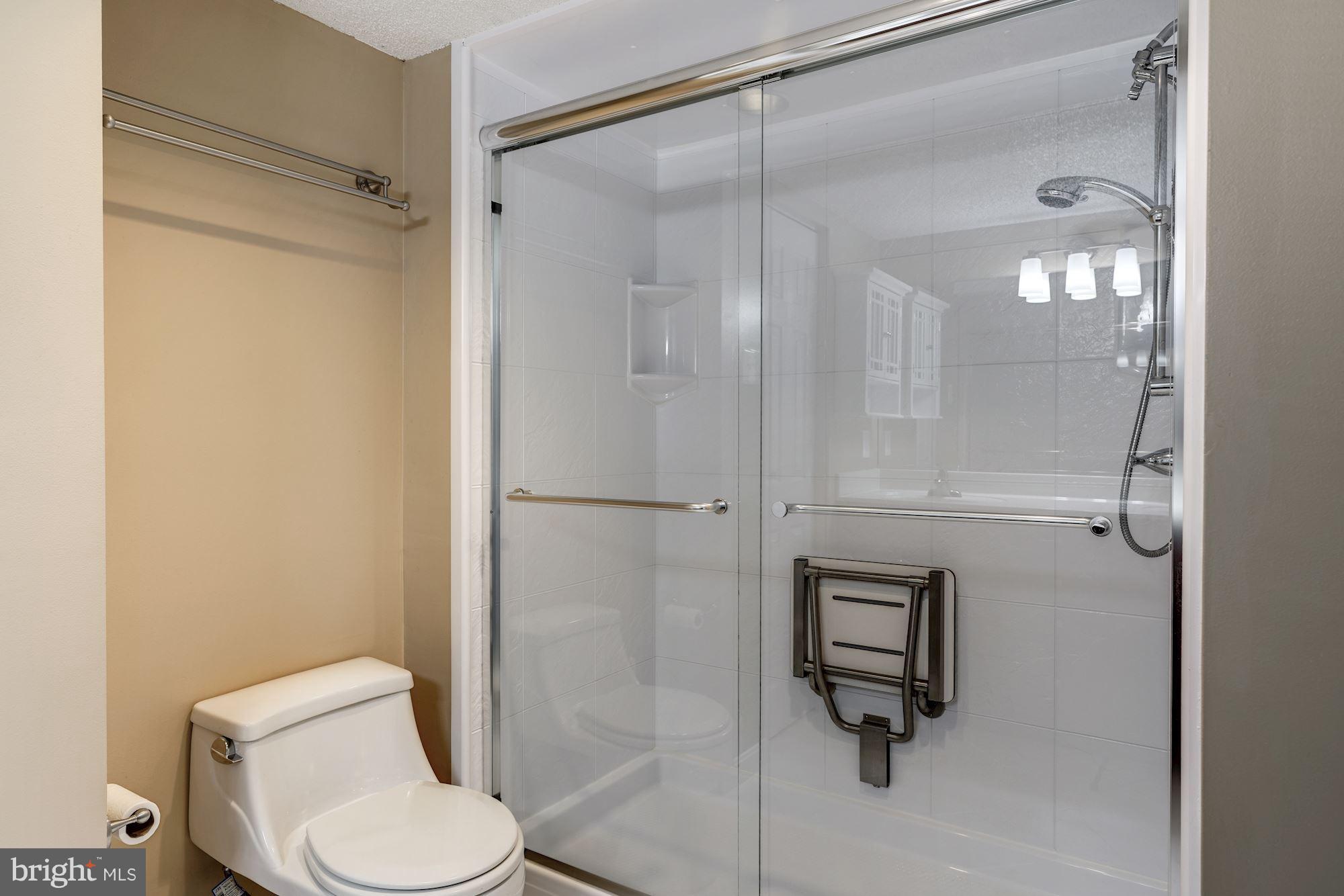 1515 South Arlington Ridge Road, Unit 205 Arlington, VA 22202 - Photo 21 of 30 Master bath walk-in shower w/a seat
