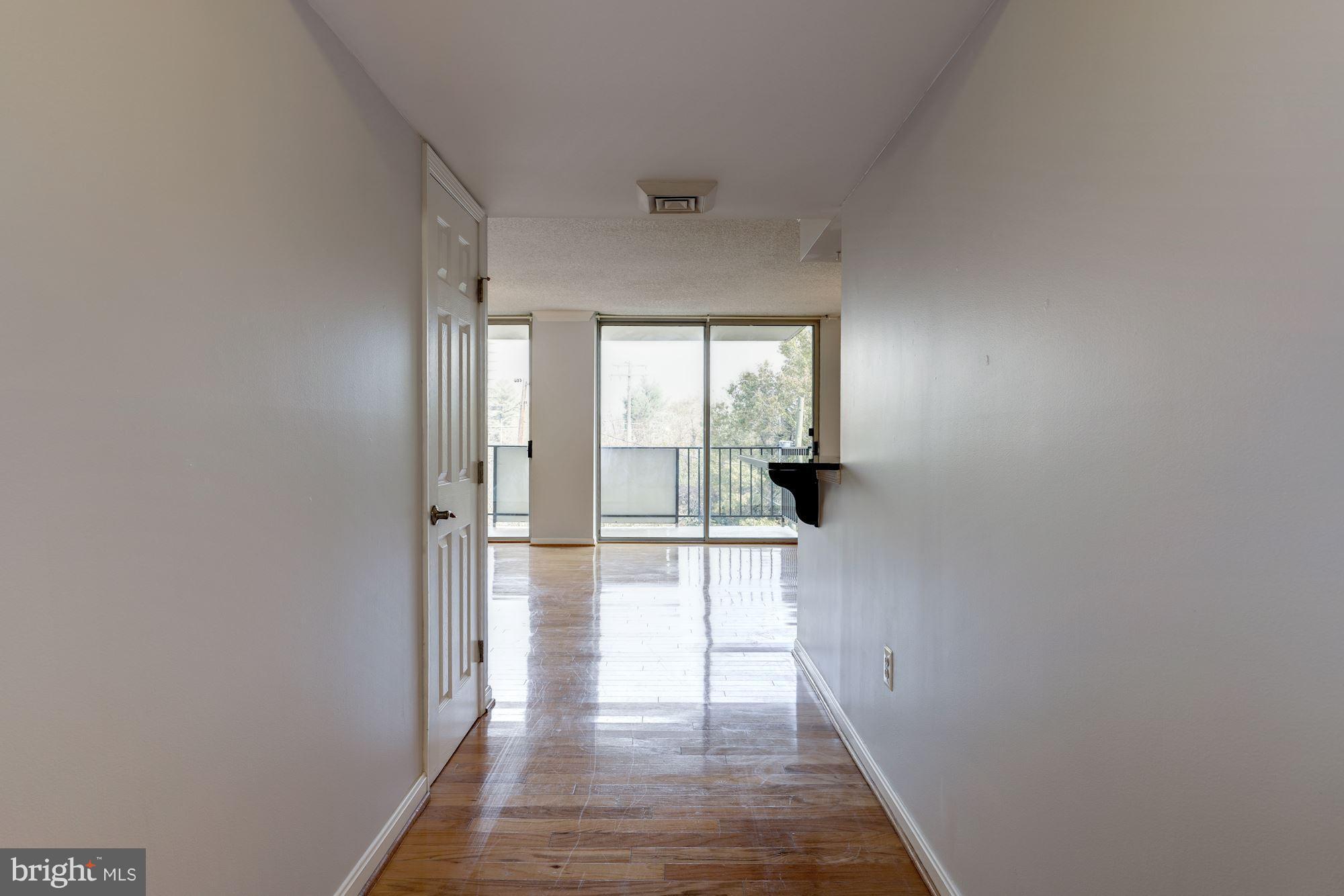 1515 South Arlington Ridge Road, Unit 205 Arlington, VA 22202 - Photo 4 of 30 Welcoming entry foyer