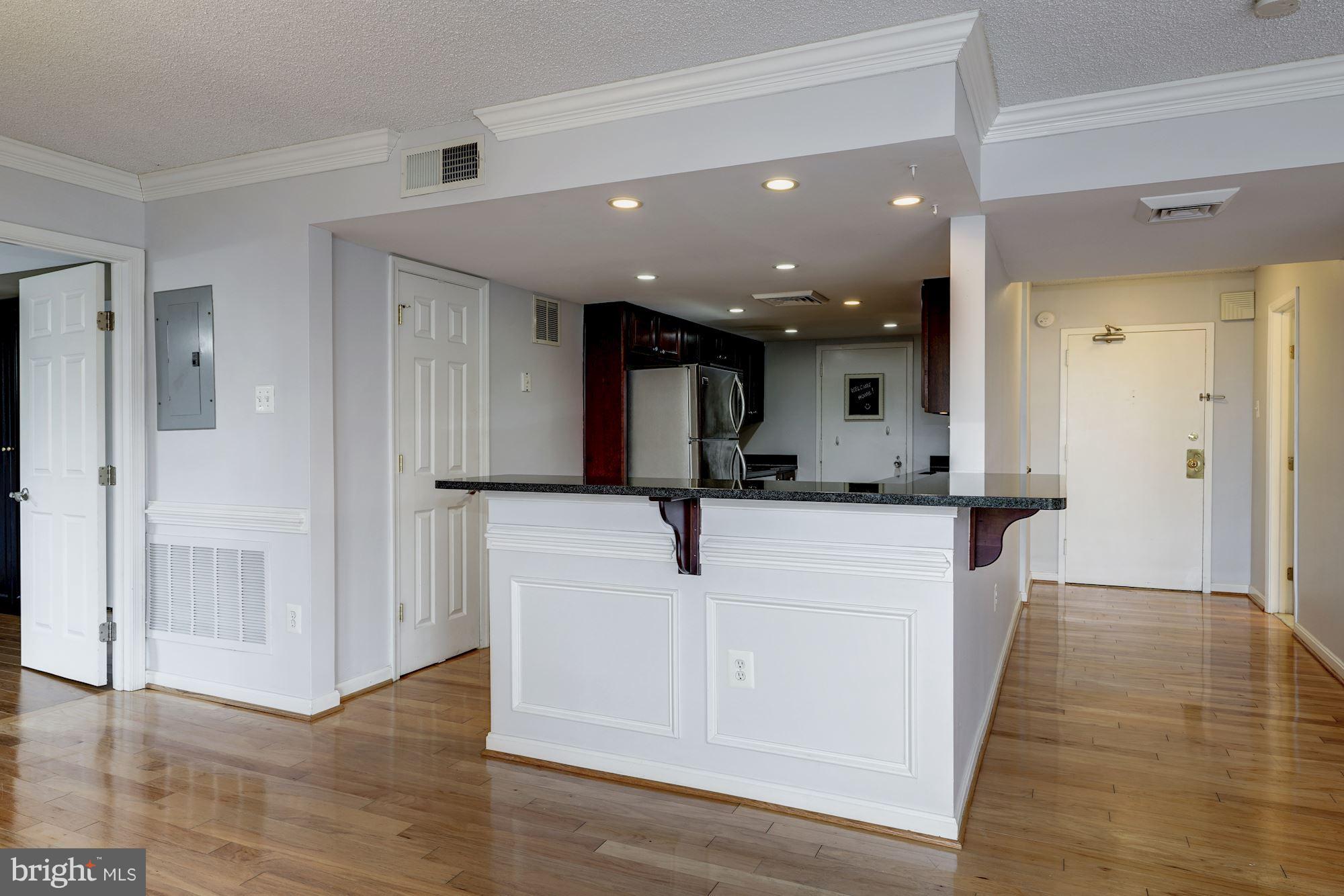 1515 South Arlington Ridge Road, Unit 205 Arlington, VA 22202 - Photo 9 of 30 Open kitchen w/a serving bar