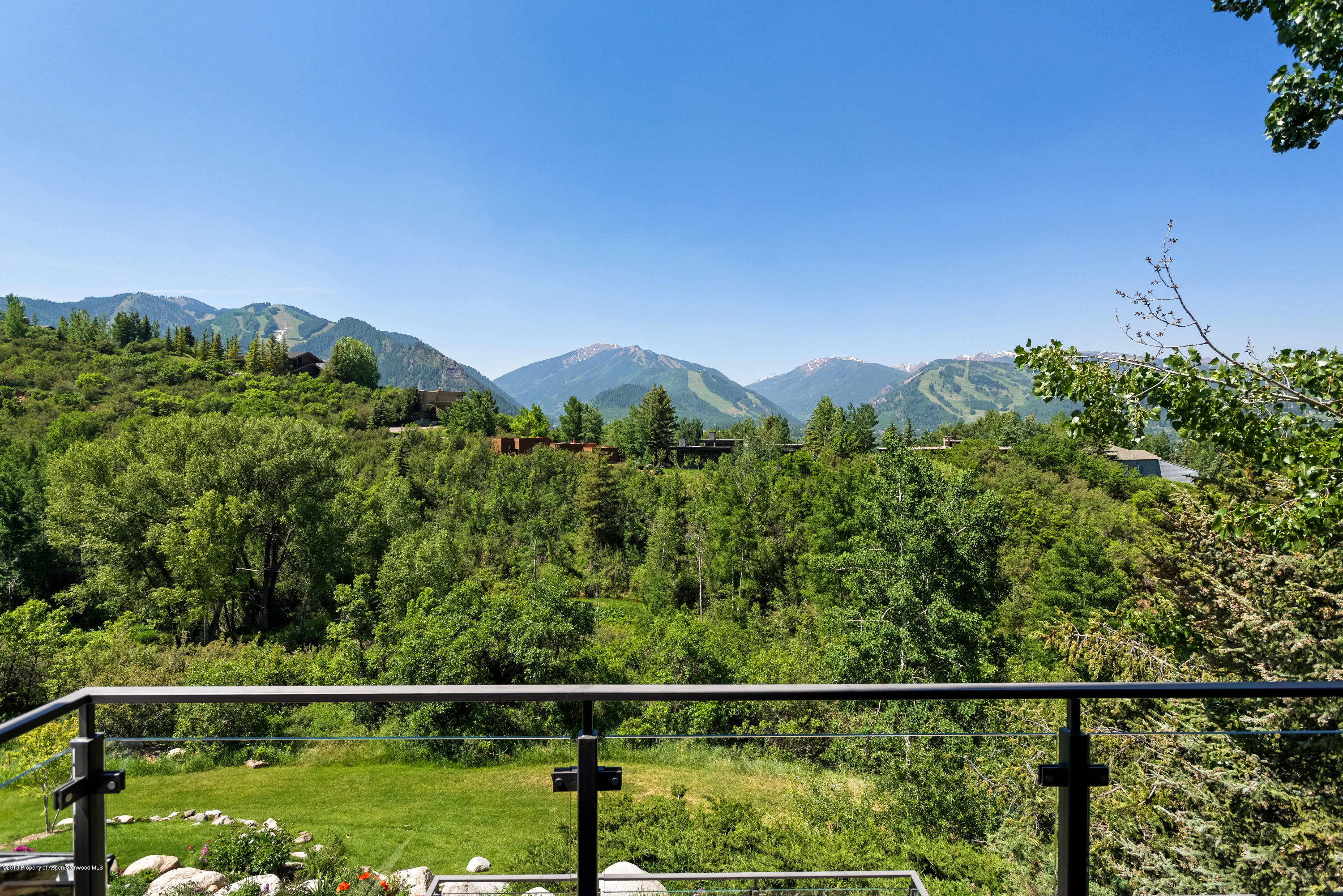 274 Draw Drive Aspen, CO 81612 - Photo 13 of 32 a view of a yard with a fence
