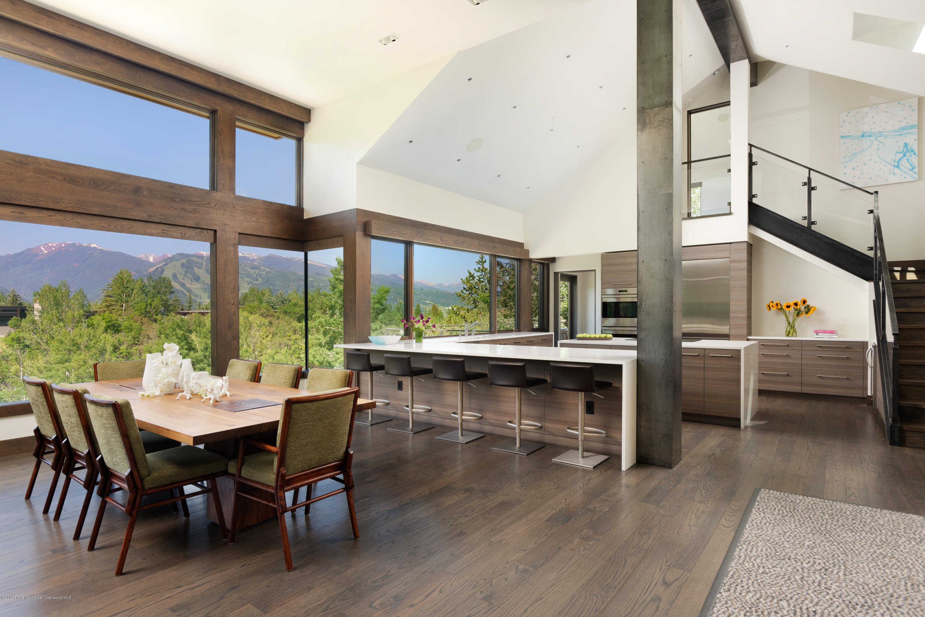 274 Draw Drive Aspen, CO 81612 - Photo 2 of 32 a view of a dining room with furniture window and wooden floor