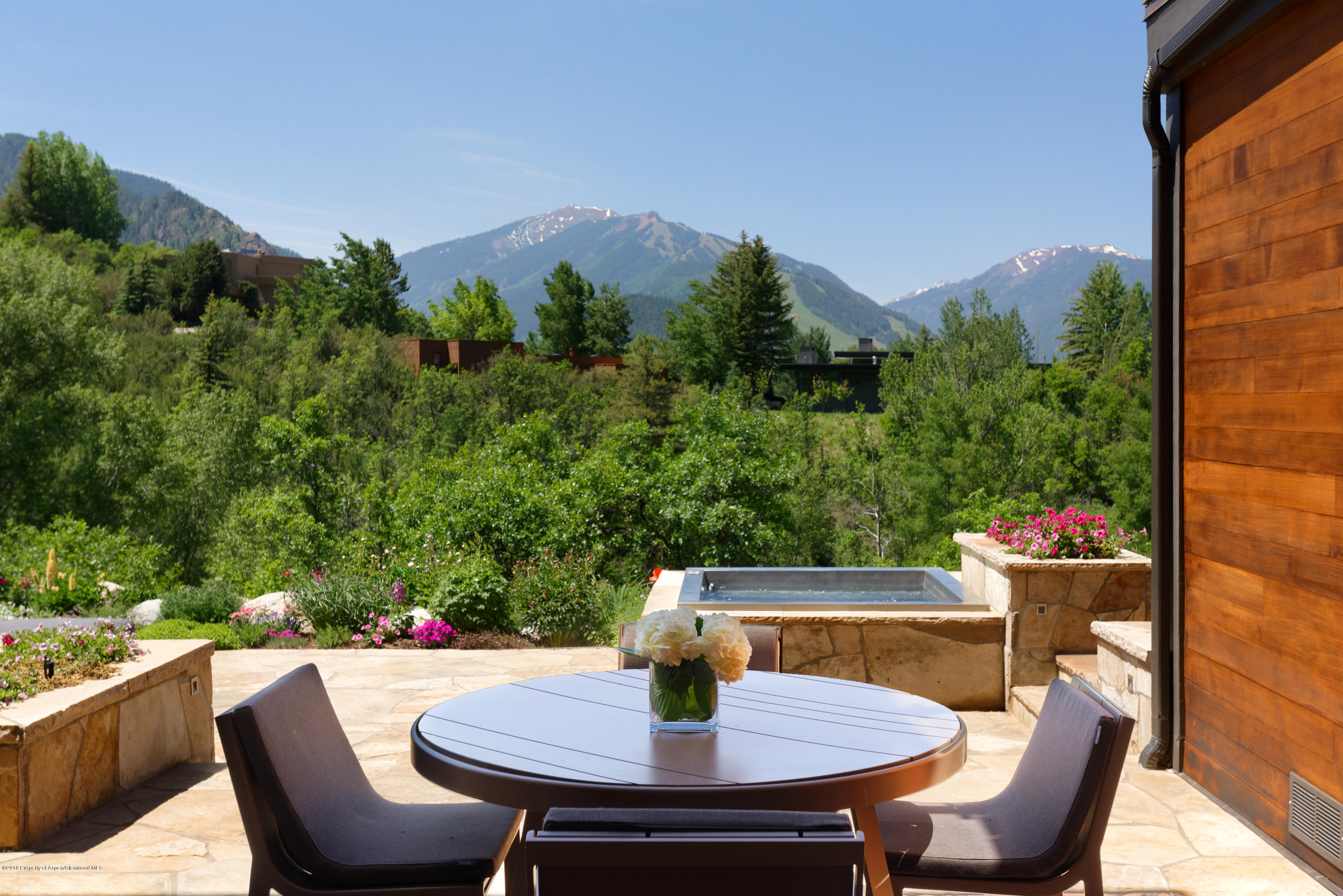 274 Draw Drive Aspen, CO 81612 - Photo 27 of 32 a table and chairs in a patio