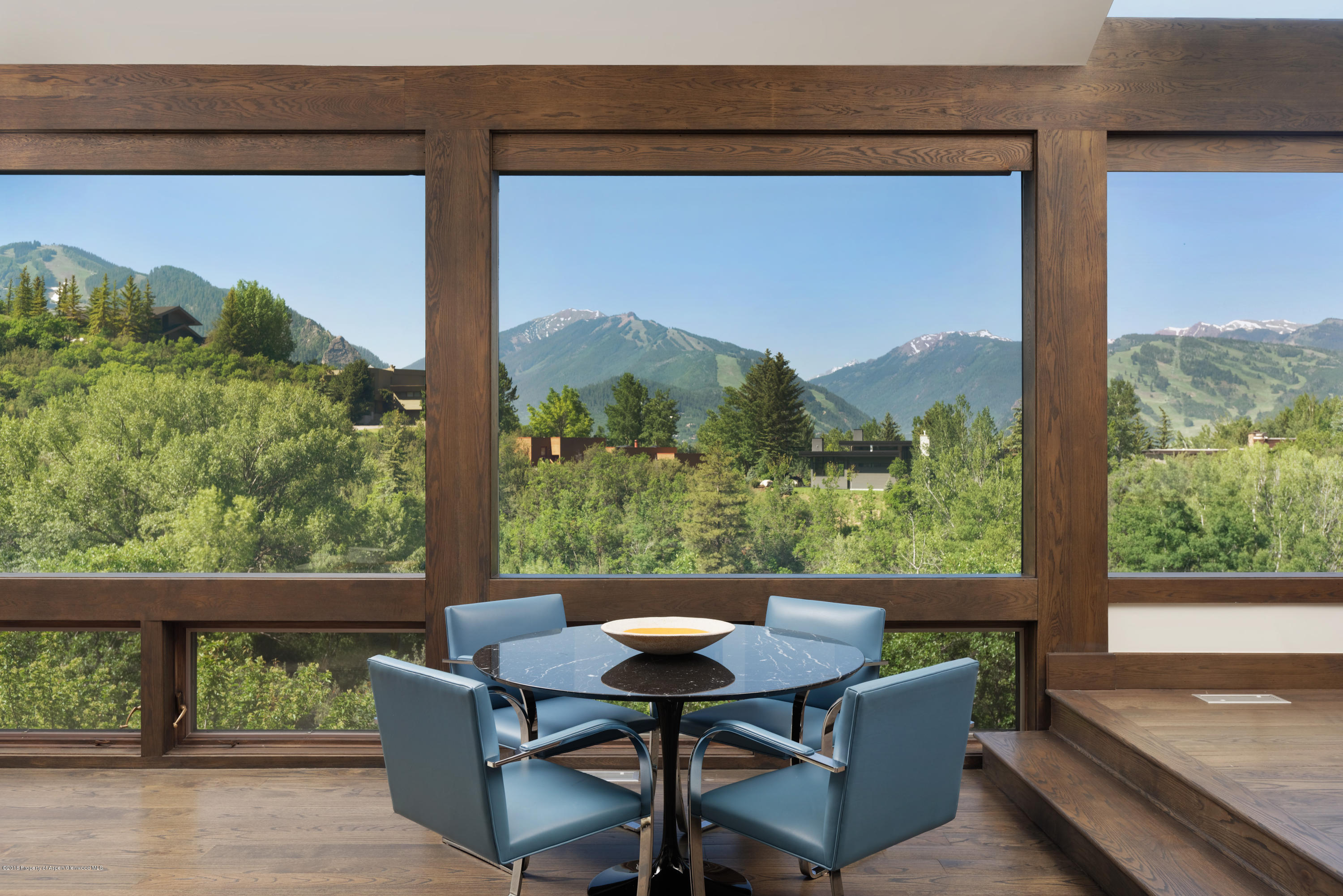 274 Draw Drive Aspen, CO 81612 - Photo 5 of 32 a view of a porch with a table and chairs