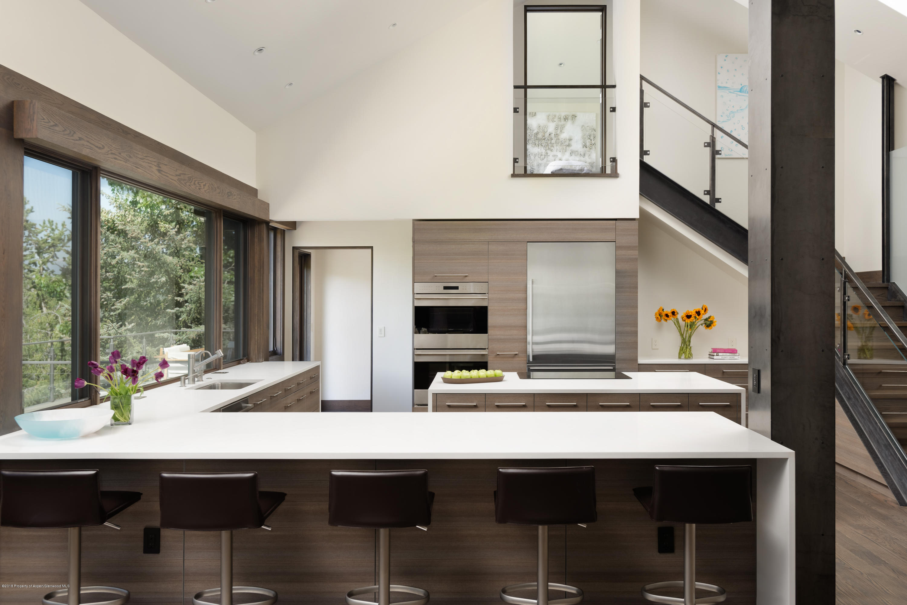 274 Draw Drive Aspen, CO 81612 - Photo 7 of 32 a kitchen with a table and chairs in it