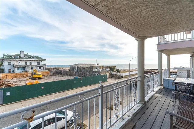 a view of a balcony with city view