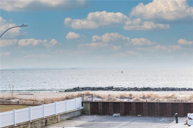 a view of beach and kitchen