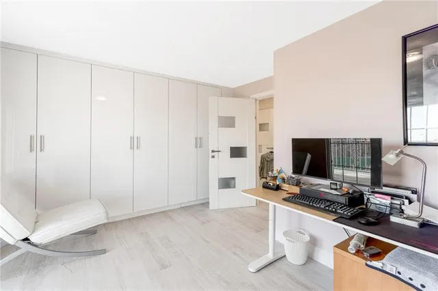 a room with furniture and a flat screen tv