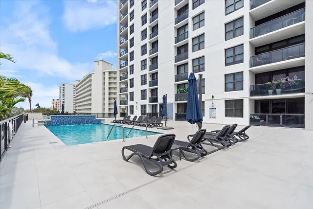a view of a terrace with sitting area